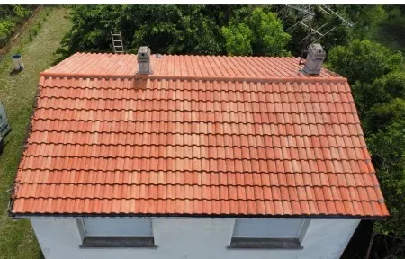Tiled roof cleaned with steam, aerial view by Aquit'n Nettoyage